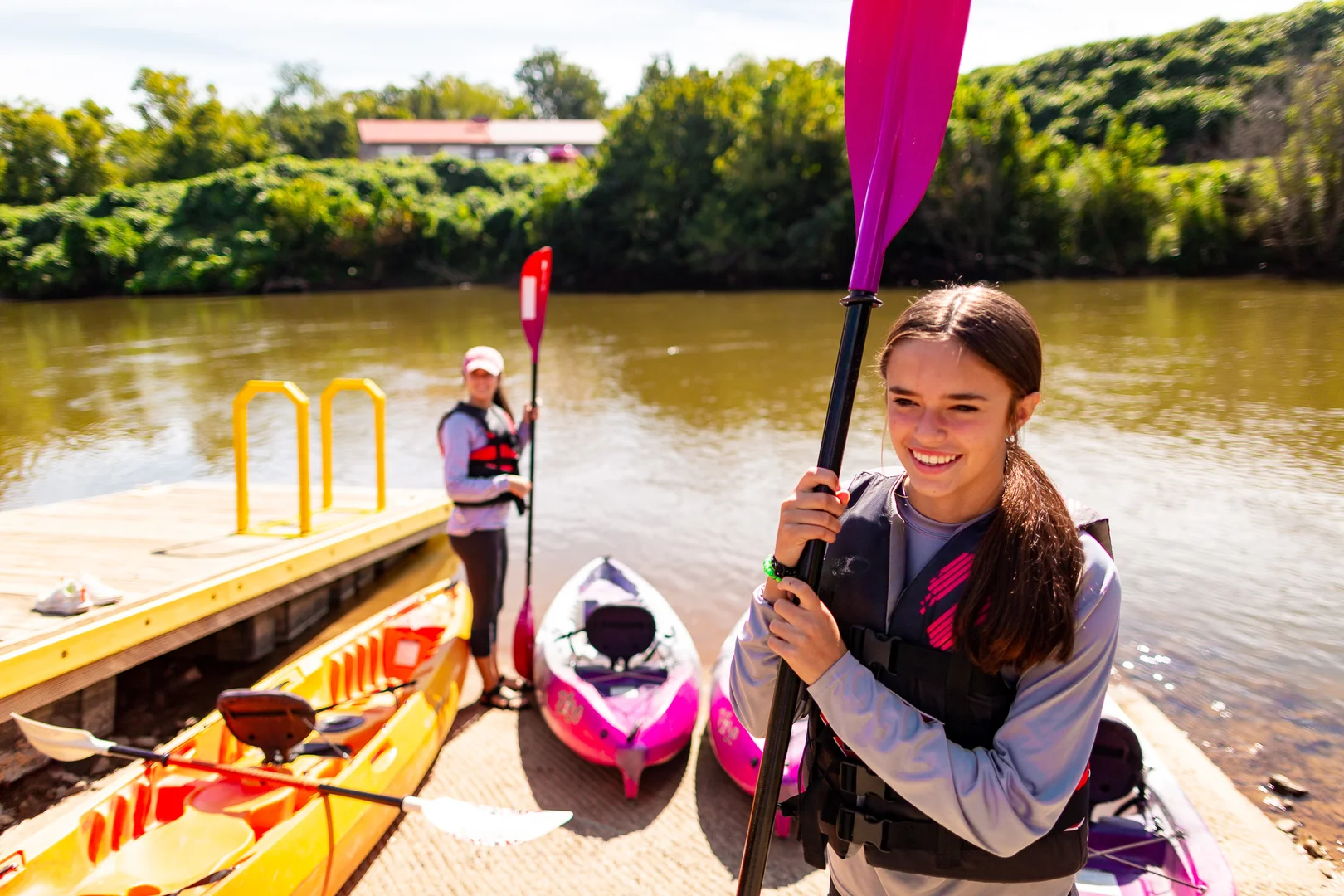 Kayakers in spring at river
